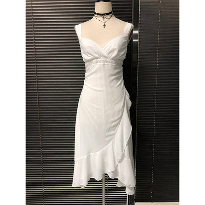 White chiffon camisole dress with V bodice, cinched waist seam, and flowing midi skirt