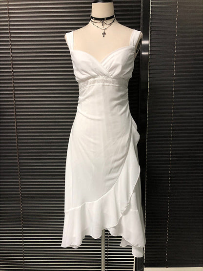 White chiffon camisole dress with V wrap bodice and fitted waist; flared midi hem
