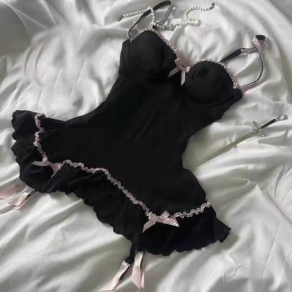 Black lace-trim lingerie babydoll with bow accents and scalloped ruffle hem