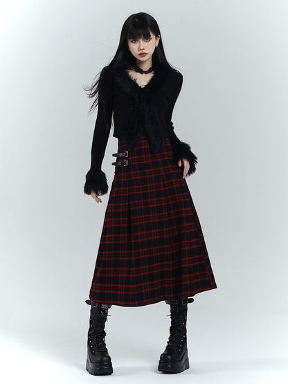 Long A-line plaid skirt in red and black tartan, waistband with side buckle straps