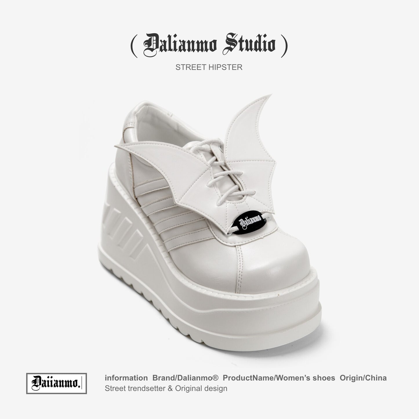 White lace-up platform boots with winged side panels and chunky tread sole