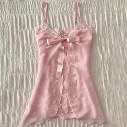 Pink satin babydoll camisole with center bow and lace trim