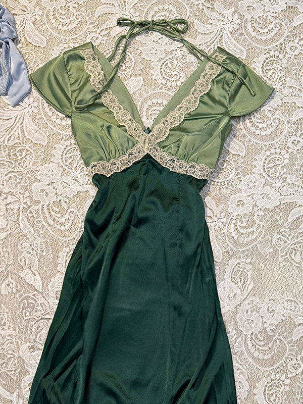 Two-tone green satin V-neck dress with lace bib detail and bow-tie neckline