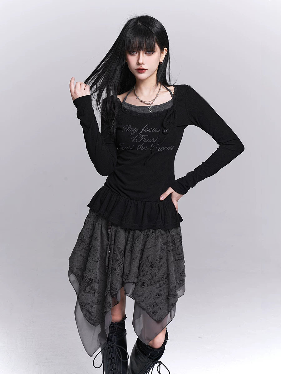 Black long-sleeve tunic with ruffled neckline, tiered skirt overlay, asym hem