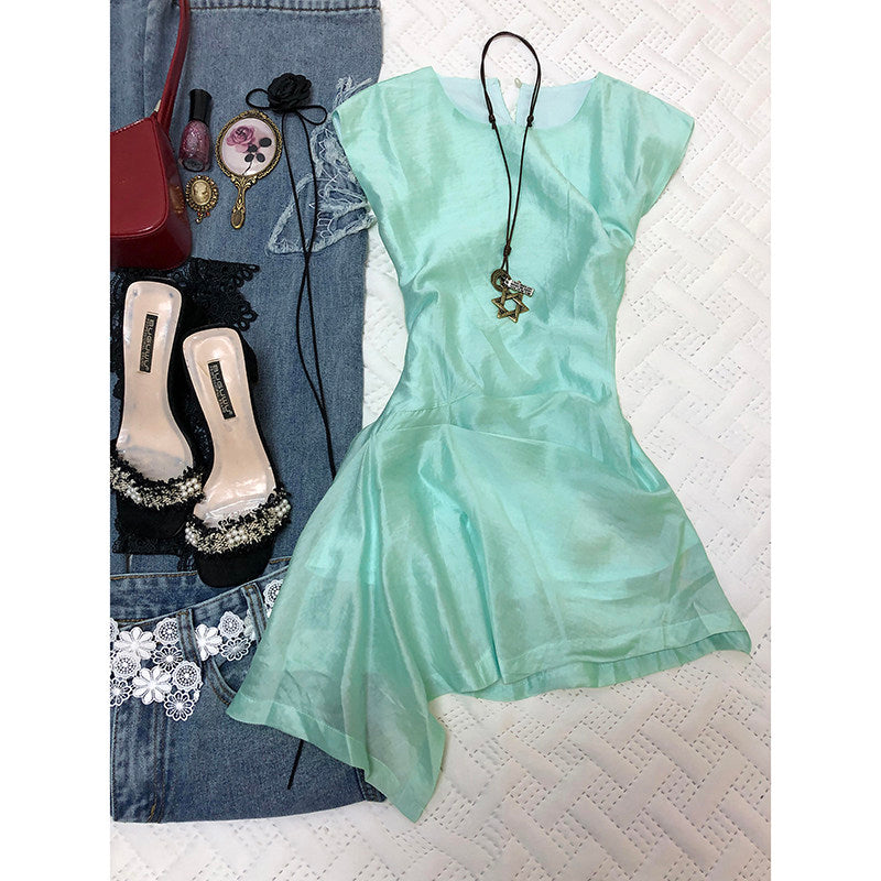 Mint green sleeveless mini dress with asymmetrical flared hem