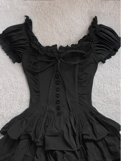 Black off-shoulder cake dress with bow lacing, button placket, and ruffled sleeves