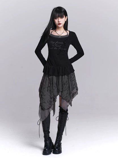 Black long-sleeve dress with fitted bodice, ruffled waist, patterned asymmetrical skirt