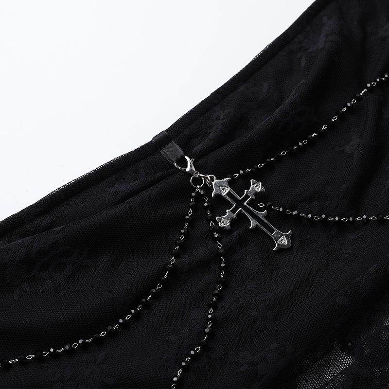 Black mesh top detail with silver-tone chain and cross charm