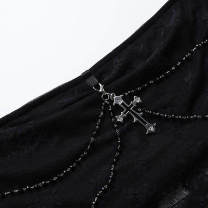 Black mesh top detail with silver-tone chain and cross charm
