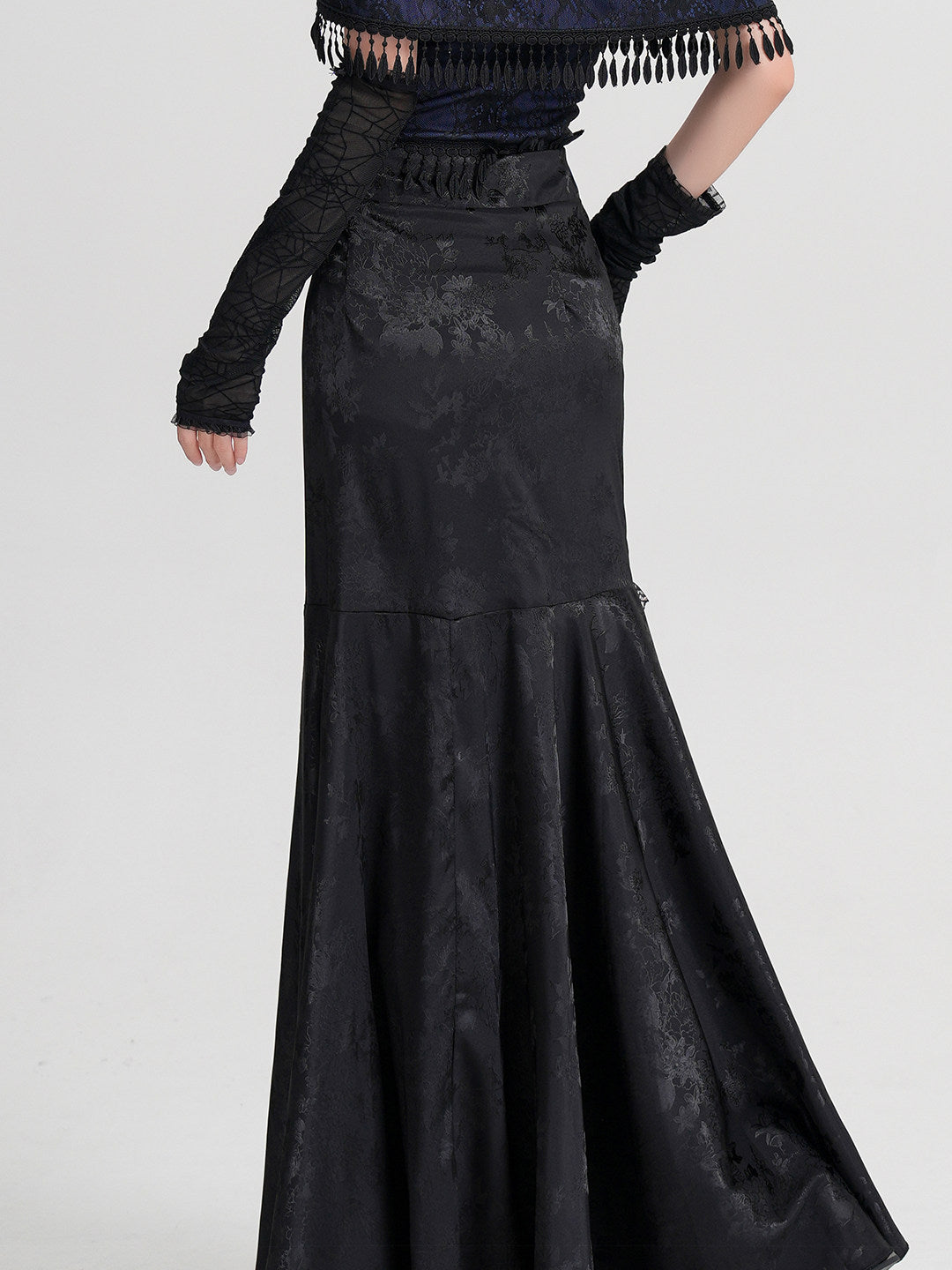 Black jacquard midi skirt with waistband bands and flared pleated hem