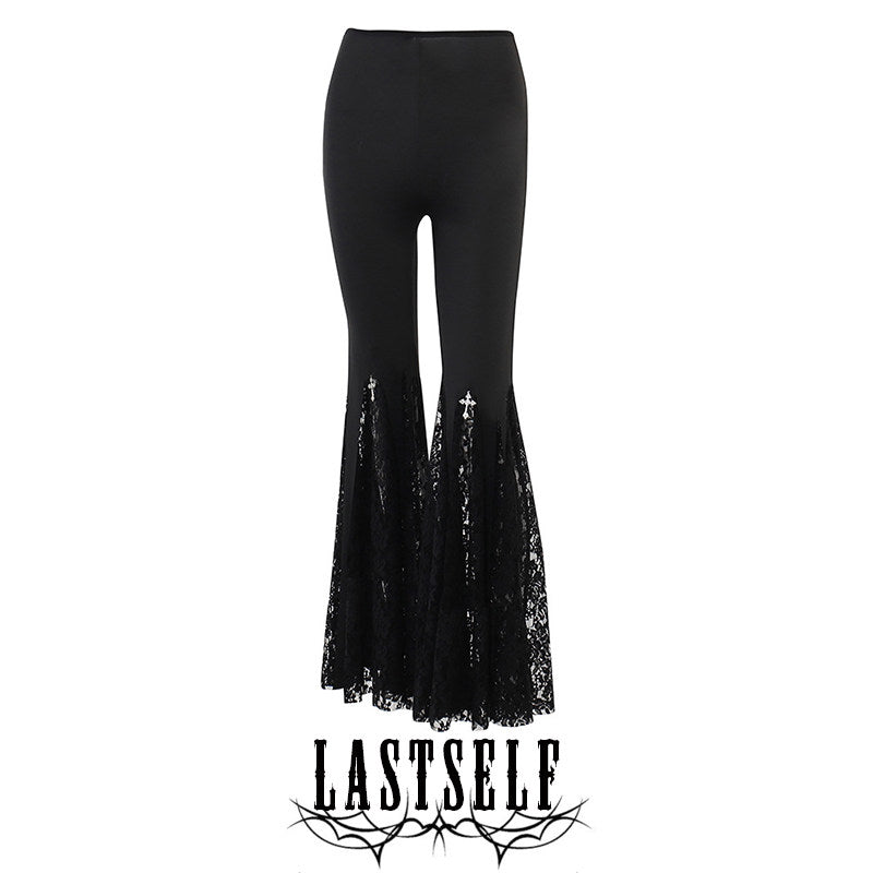 High-rise black pants with lace-trim bell hem and small cross-like embroidered accents
