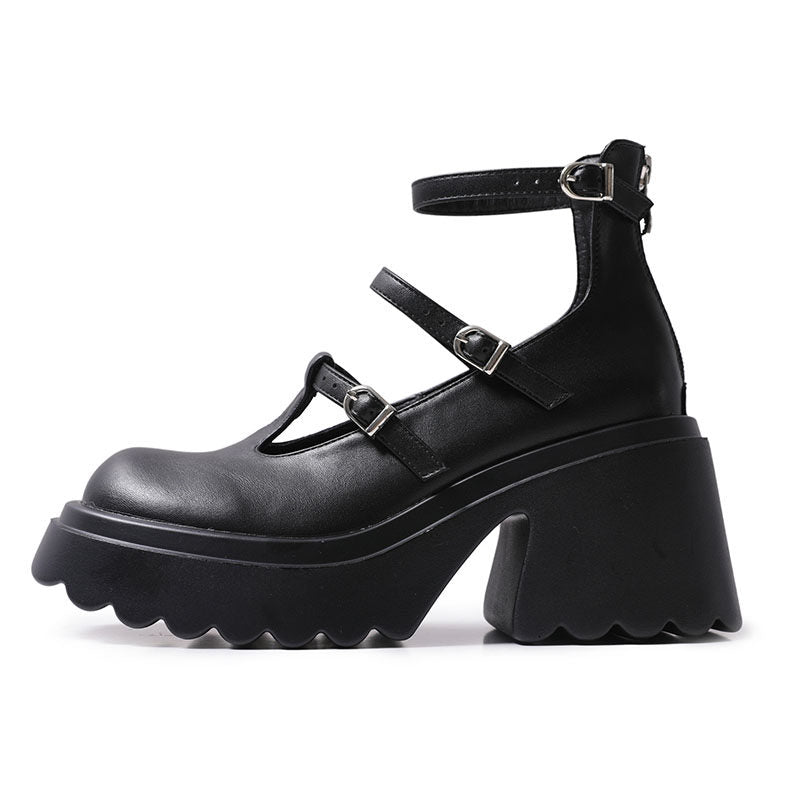 Black Mary Jane platform high heels, side profile with chunky heel and buckles