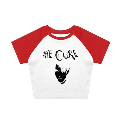 Red and white raglan graphic tee with black The Cure logo and portrait print