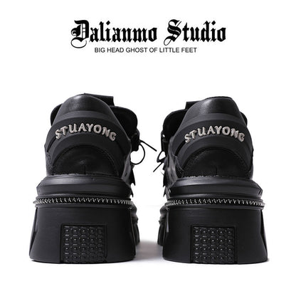 Black platform flats back view with lace-up, heel tab, and chunky platform sole